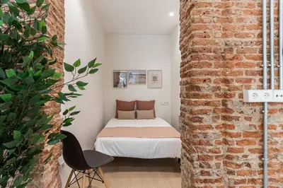 Cama o camas de una habitación en Retiro City Center Apartment