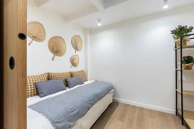 Cama o camas de una habitación en Retiro City Center Apartment