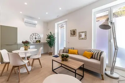 Zona de estar de Retiro City Center Apartment