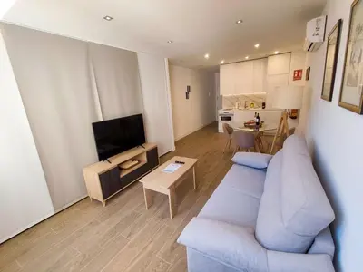 Una televisión o centro de entretenimiento en Apartamentos BONDELA