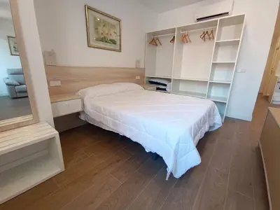 Cama o camas de una habitación en Apartamentos BONDELA