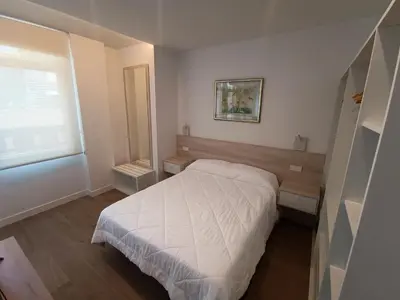 Cama o camas de una habitación en Apartamentos BONDELA