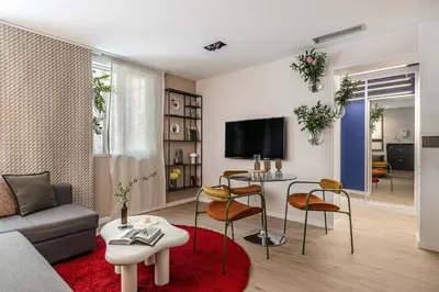 Una televisión o centro de entretenimiento en Waou La Latina V - Alquiler Corta Duración