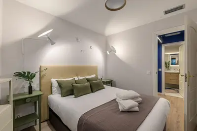 Cama o camas de una habitación en Waou La Latina V - Alquiler Corta Duración