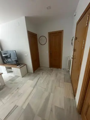 Una televisión o centro de entretenimiento en Beautiful Apartment in Retiro