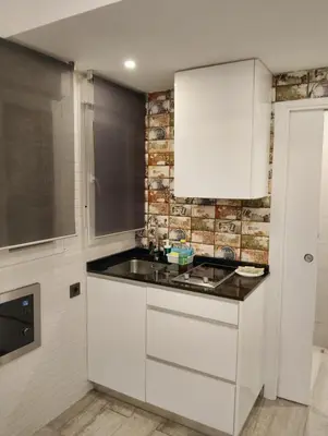 Una cocina o zona de cocina en New York charm in the heart of Chueca - Barbara
