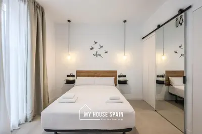 Cama o camas de una habitación en MyHouseSpain - Santero Apartments A