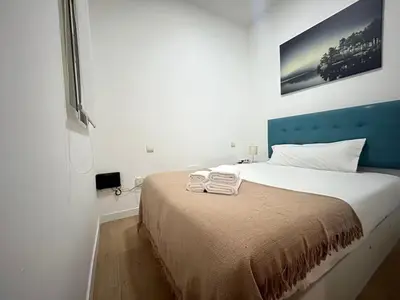 Cama o camas de una habitación en Flat in Vallecas - Your Urban Oasis in Madrid