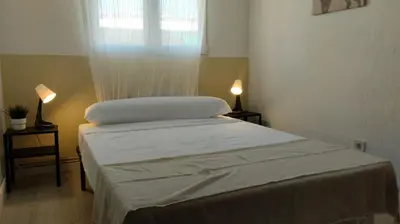 Cama o camas de una habitación en Usera Habitaciones B