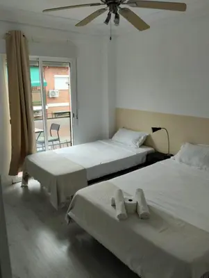 Cama o camas de una habitación en Usera Habitaciones A