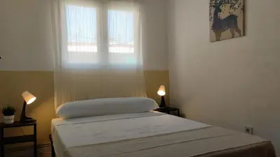 Cama o camas de una habitación en Usera Habitaciones A