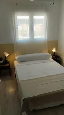 Cama o camas de una habitación en Usera Habitaciones A