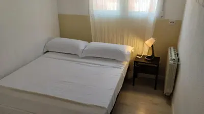 Cama o camas de una habitación en Usera Habitaciones A