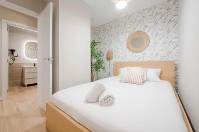 Cama o camas de una habitación en Real encanto para 8, al pie de Plaza España