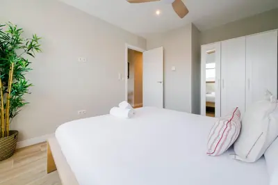 Cama o camas de una habitación en Real encanto para 8, al pie de Plaza España