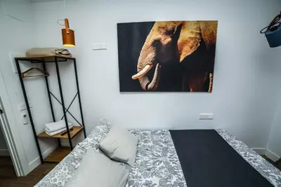 Cama o camas de una habitación en Hotel Maruja en Cascorro