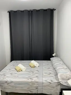 Cama o camas de una habitación en RI HOSTELs