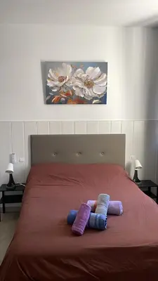 Cama o camas de una habitación en RI HOSTELs