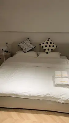 Cama o camas de una habitación en 马德里Usera民宿