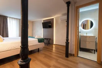 Cama o camas de una habitación en Negresco Plaza Mayor