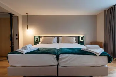 Cama o camas de una habitación en Negresco Plaza Mayor