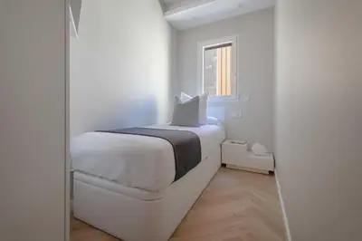 Cama o camas de una habitación en Moderno apartamento junto a Plaza España