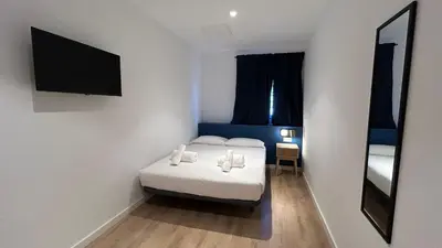 Cama o camas de una habitación en Hotelito Boutique Madrid Pacífico