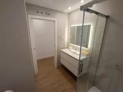 Un baño de Apartamentos DALA