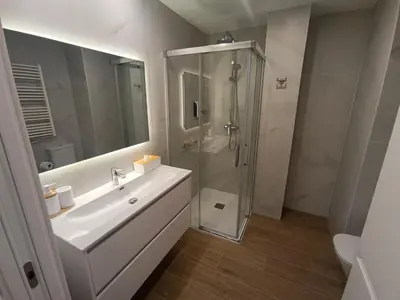 Un baño de Apartamentos DALA