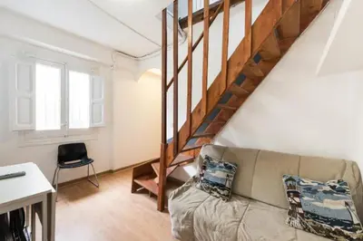 Zona de estar de Atico duplex loft Lavapies