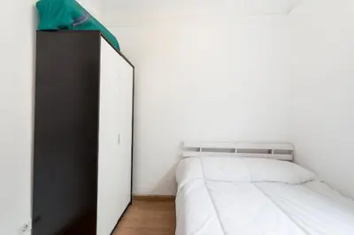 Cama o camas de una habitación en Atico duplex loft Lavapies