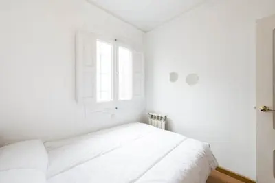 Cama o camas de una habitación en Atico duplex loft Lavapies