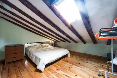 Cama o camas de una habitación en Atico duplex loft Lavapies
