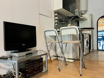 Una televisión o centro de entretenimiento en Coqueto apartamento en Chamberí 4 personas