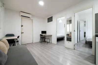 Cama o camas de una habitación en QEG14 Apto 2 Dormitorios Chamberi Quevedo
