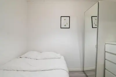 Cama o camas de una habitación en QEG14 Apto 2 Dormitorios Chamberi Quevedo