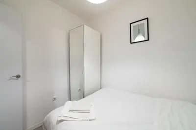 Cama o camas de una habitación en QEG14 Apto 2 Dormitorios Chamberi Quevedo