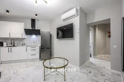 Una cocina o zona de cocina en MyHouseSpain - Piso nuevo junto a la Puerta del Sol