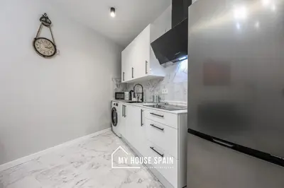 Una cocina o zona de cocina en MyHouseSpain - Piso nuevo junto a la Puerta del Sol