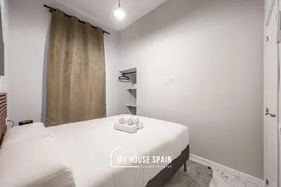 Cama o camas de una habitación en MyHouseSpain - Piso nuevo junto a la Puerta del Sol
