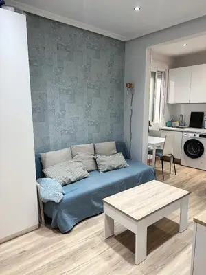 Zona de estar de Delicias Hideaway Bajo con Patio Privado cerca de Atocha