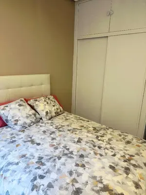 Cama o camas de una habitación en Delicias Hideaway Bajo con Patio Privado cerca de Atocha