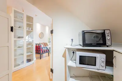 Una cocina o zona de cocina en GuestReady - Cosy place in Madrid