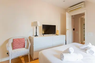 Cama o camas de una habitación en GuestReady - Cosy place in Madrid
