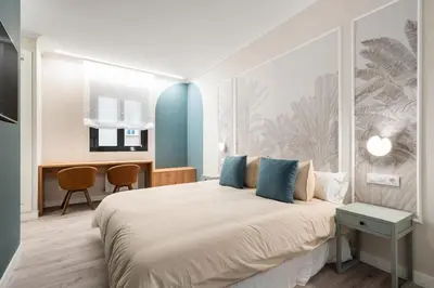 Cama o camas de una habitación en Exclusive apartment in San Bernardo by Cómodo Madrid