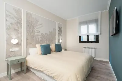 Cama o camas de una habitación en Exclusive apartment in San Bernardo by Cómodo Madrid