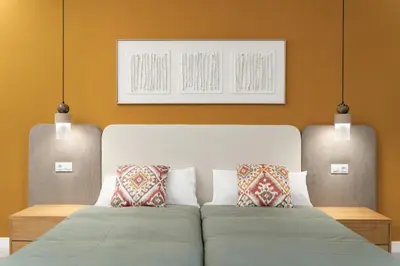 Cama o camas de una habitación en Exclusive apartment in San Bernardo by Cómodo Madrid