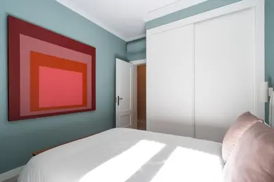 Cama o camas de una habitación en Exclusive apartment in San Bernardo by Cómodo Madrid