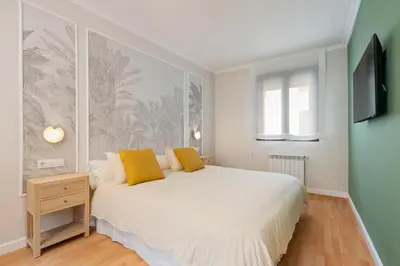 Cama o camas de una habitación en Luxury San Bernardo by Cómodo Madrid