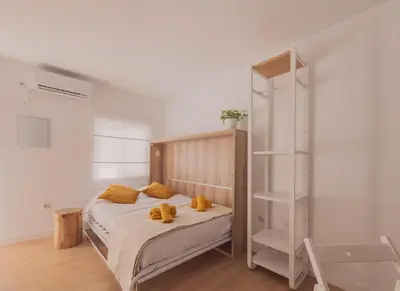 Cama o camas de una habitación en Wood 5